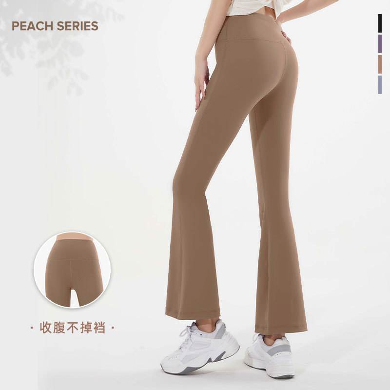 Peach-colored flared pants - texture close-up