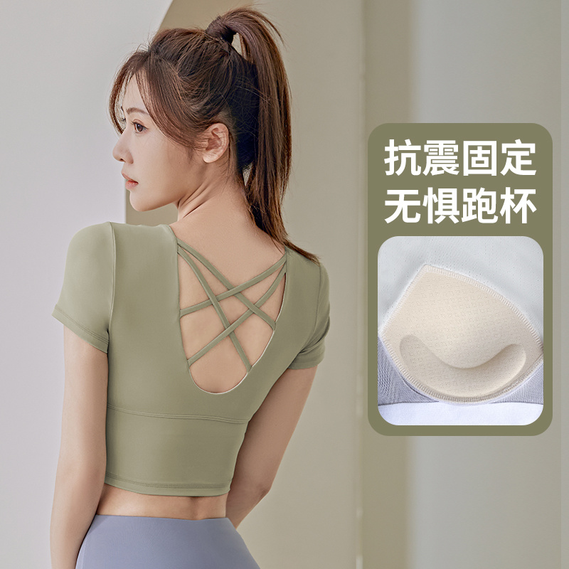 Peach-colored back-cross bra with short sleeves