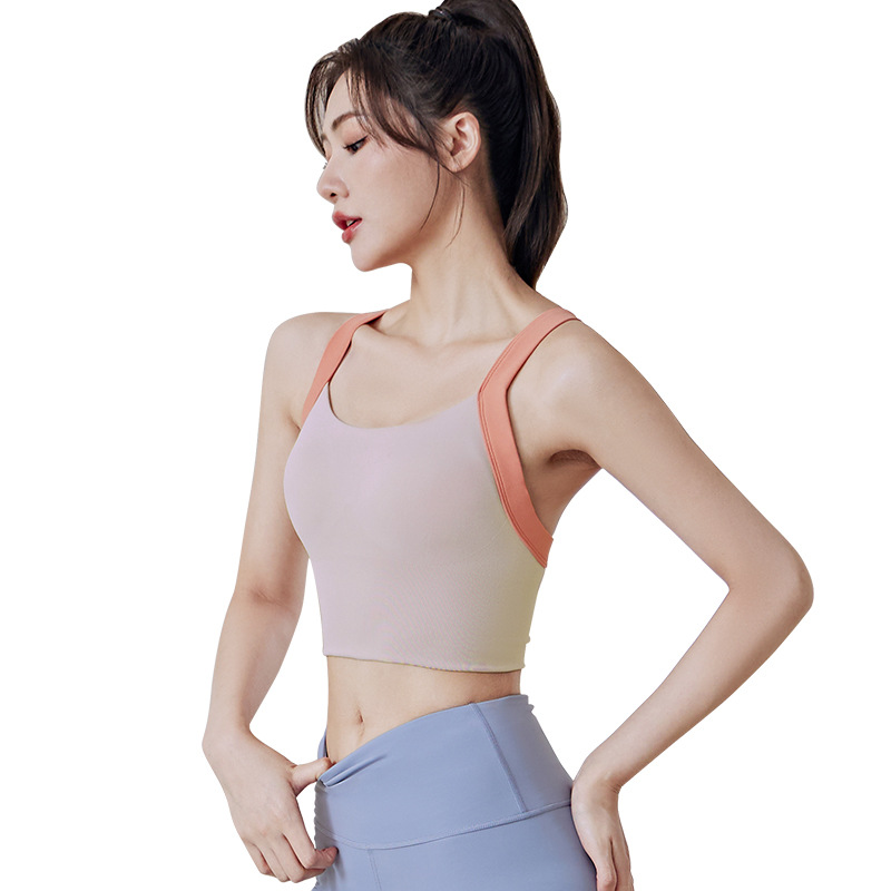 Peach-colored shoulder strap color-block bra - in-use view