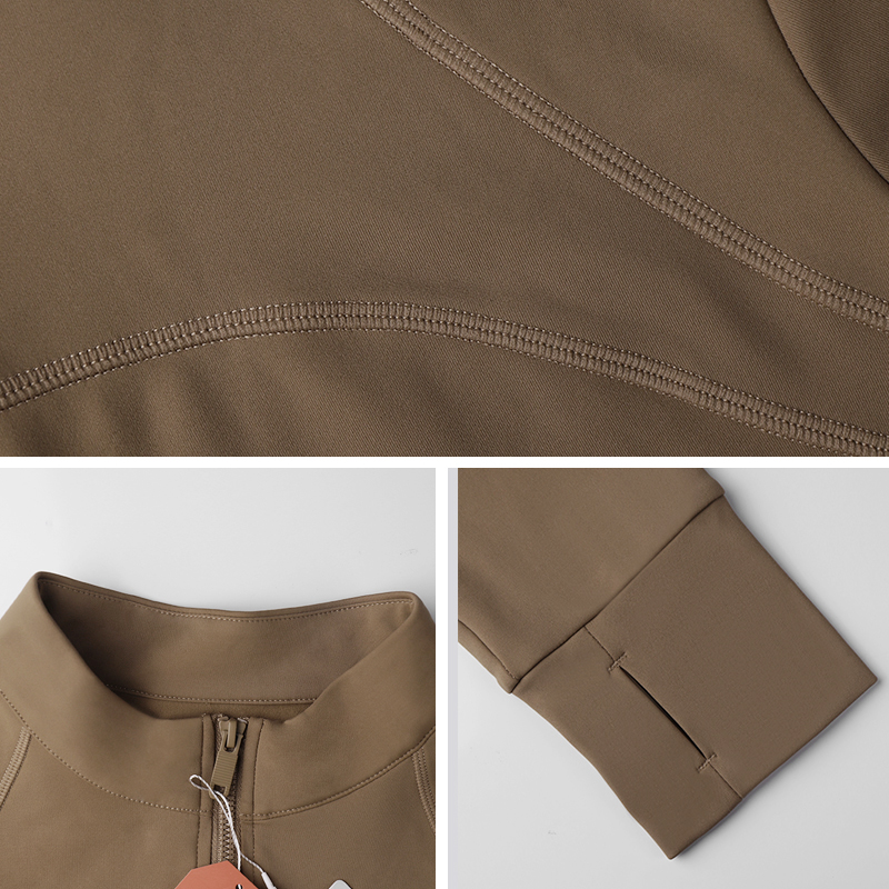 LAHN new long-necked sport coat for women, slim-fitting and flattering, versatile and easy to wear. With zippers. Fitness, yoga and sport clothing. Long sleeves. Autumn style. - texture close-up