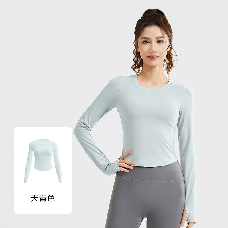 Peach sports long-sleeved shirt - texture close-up