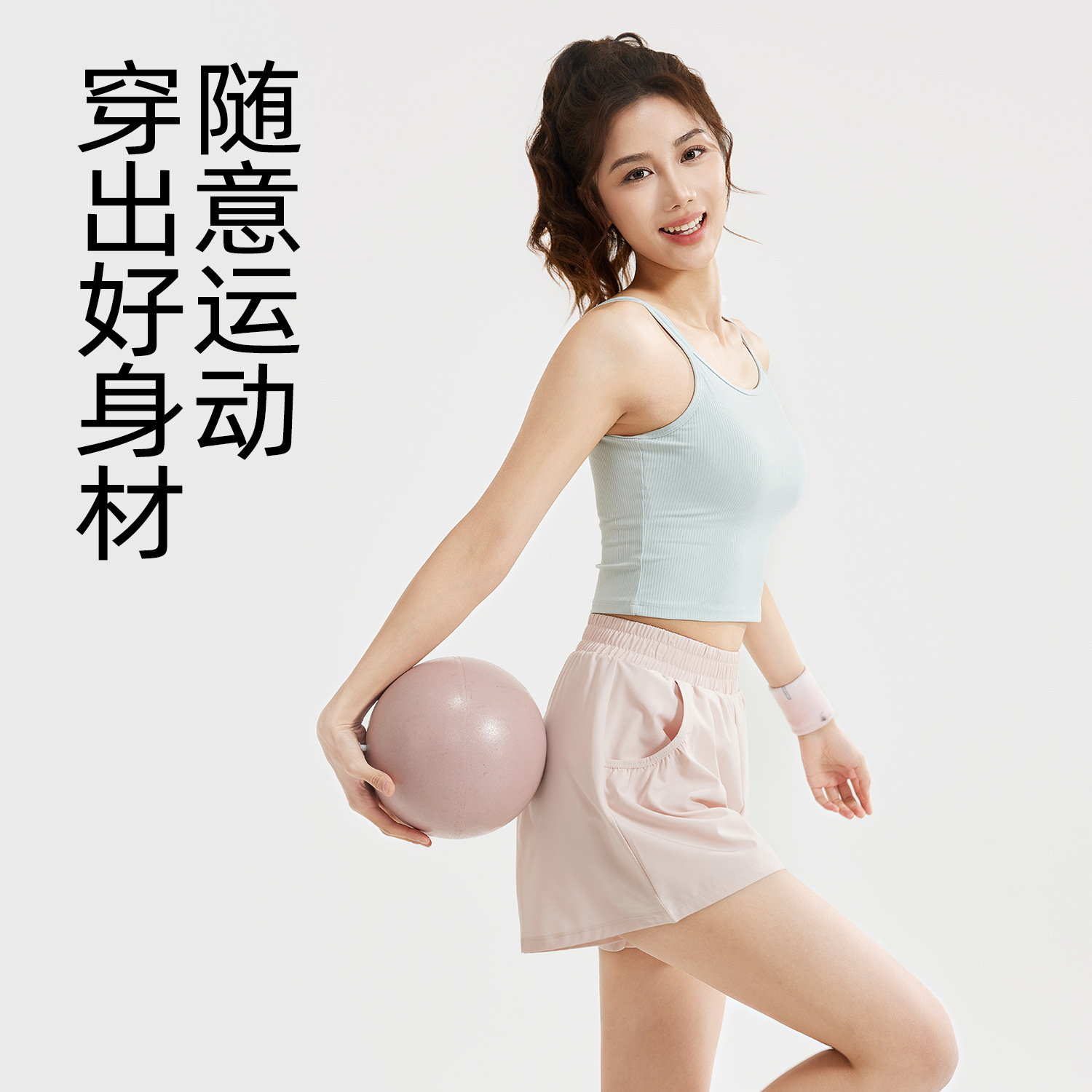 Peach-colored pleated shorts - side view