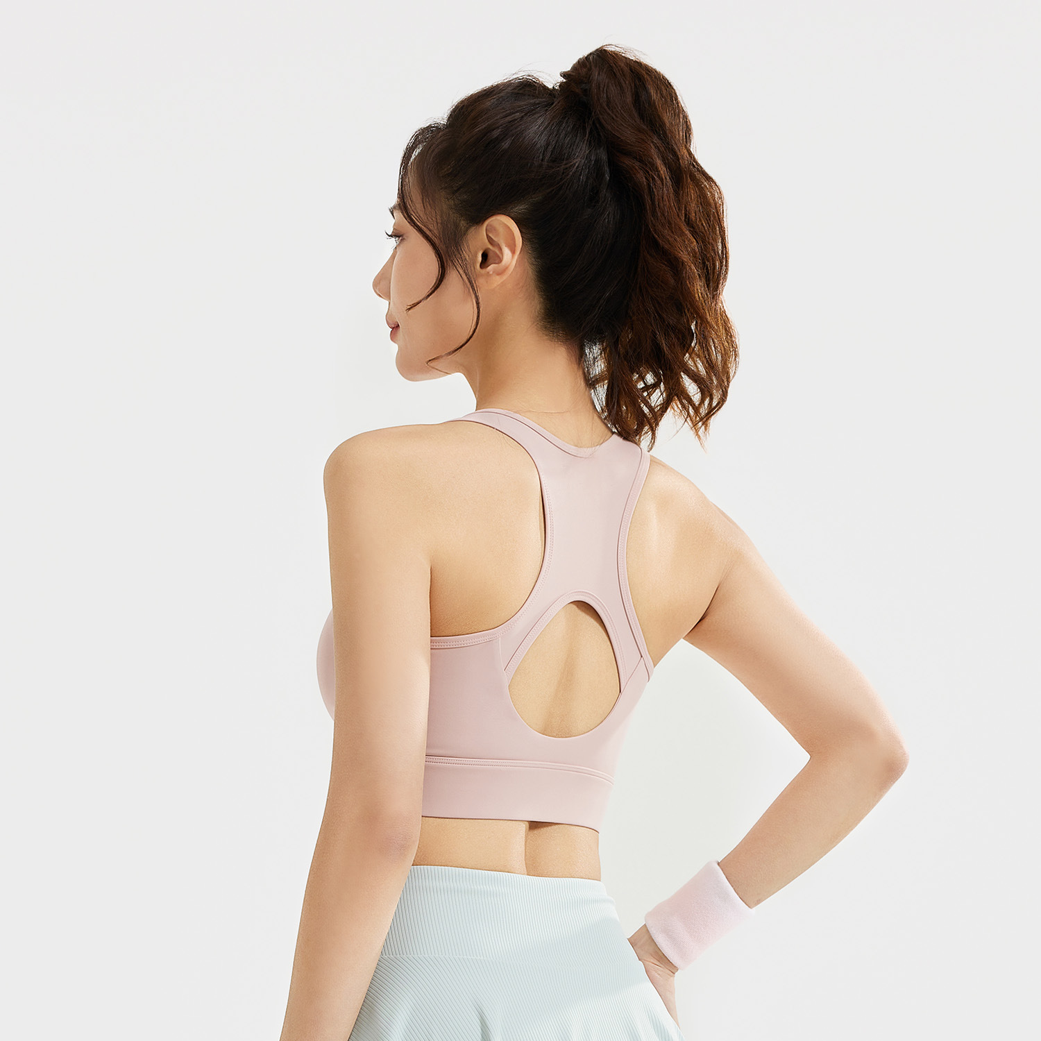 Peach-colored bra with a pleated front zipper - detail view