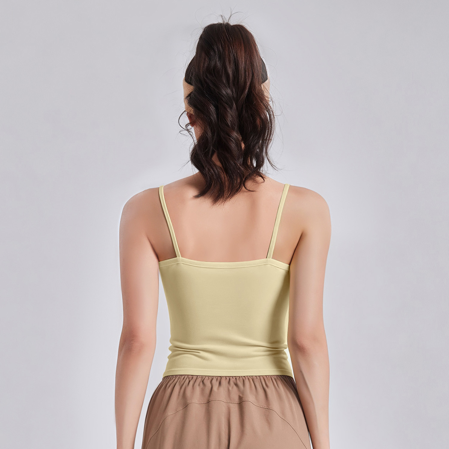 Peach-colored waist-shaping pleated blouse - detail view