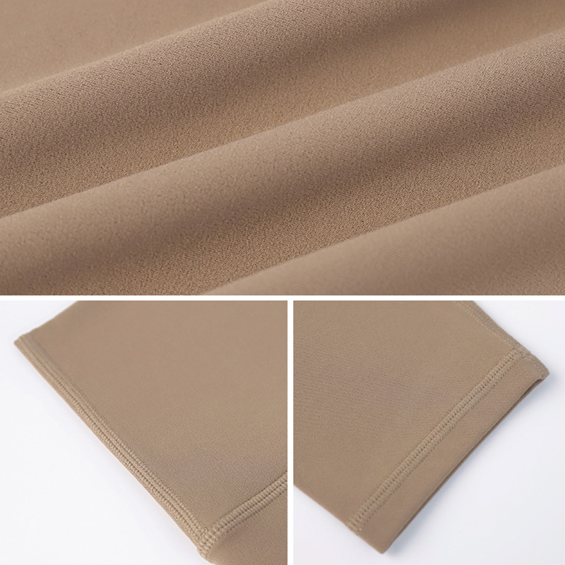 New slim-fit cloud-textured yoga pants with a three-quarter length, without sizing, without embarrassing seams, high-waisted, hip-raising, sports-style tight pants for women to wear outside. - texture close-up