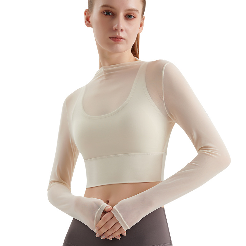 LAHN double-layer yoga top for women with built-in padding, featuring cross-over thin straps and stylish net fabric, providing breathability and long sleeves for fitness. Summer wear. - in-use view