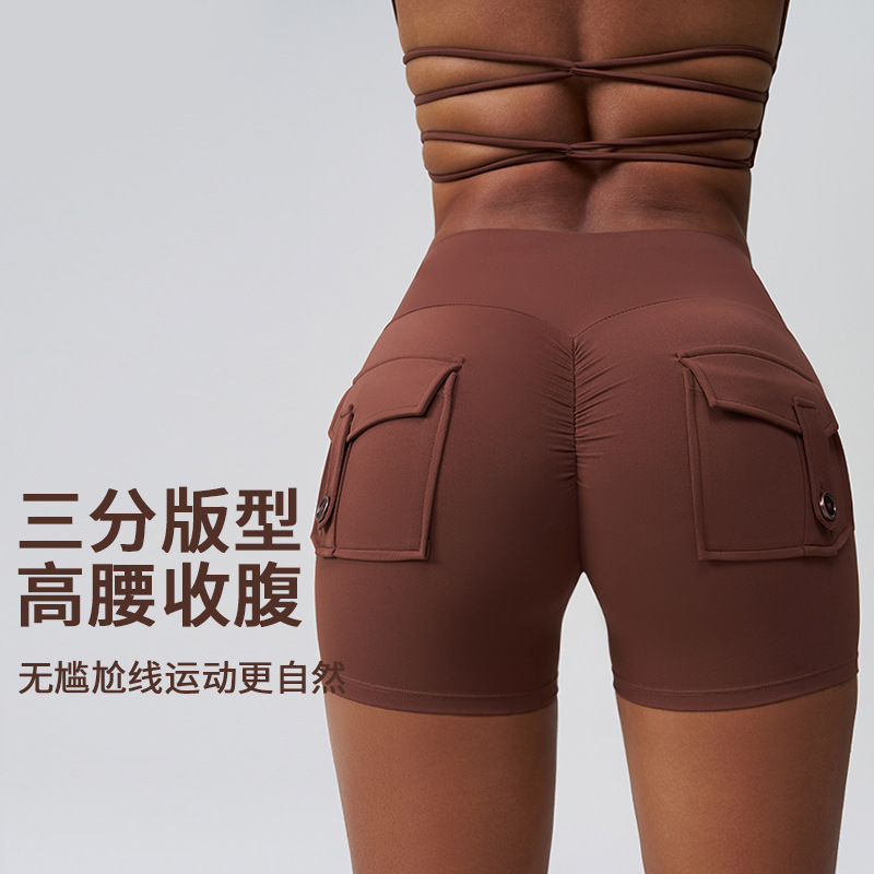 Walton sport-style three-quarter length shorts for women, with high waist, tummy-revealing, no embarrassing lines, full buttocks pleats, and pocket design for yoga shorts. - detail view