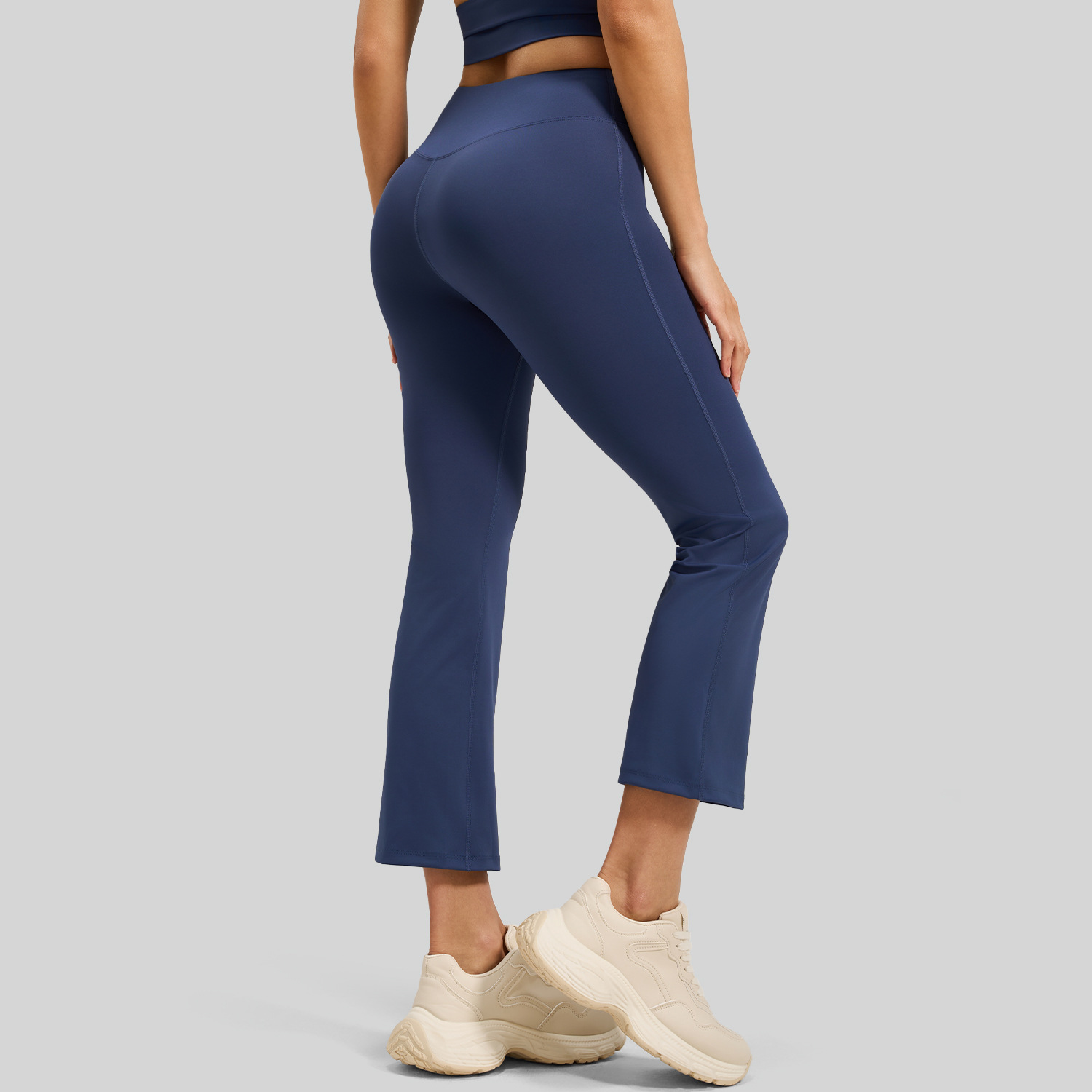 Peach-colored cigarette-style pants - detail view